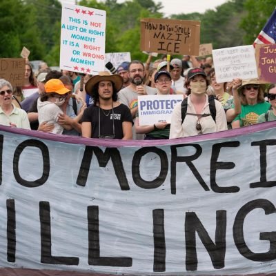 Protest over killing of driver by ICE officer in US